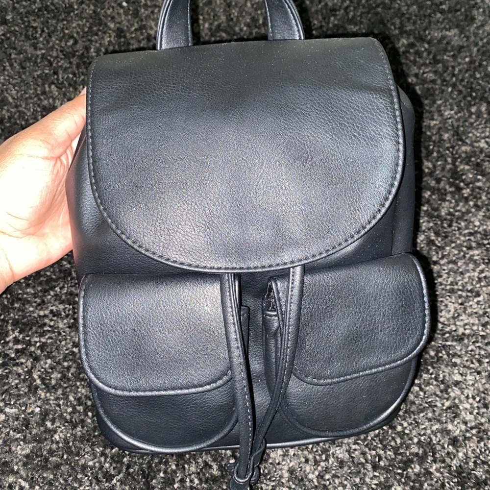 Small simple black leather backpack